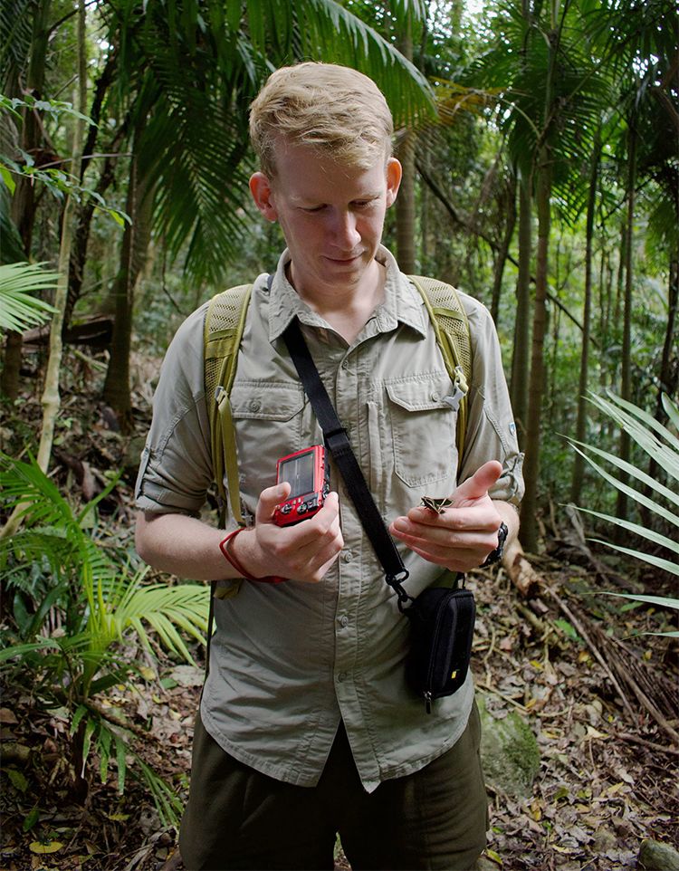 James Tweed inspecting an insect