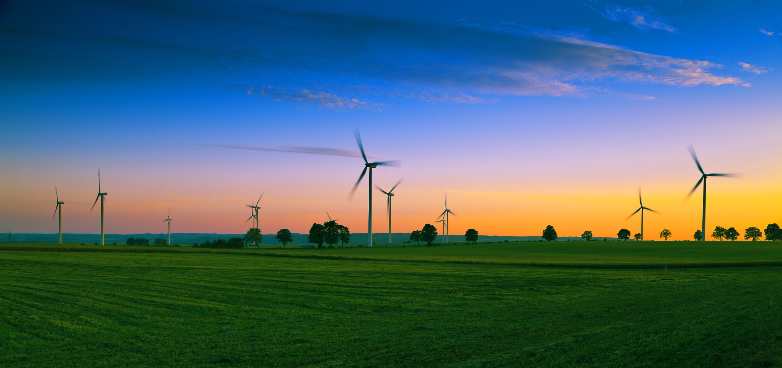 A wind farm at twilight.
