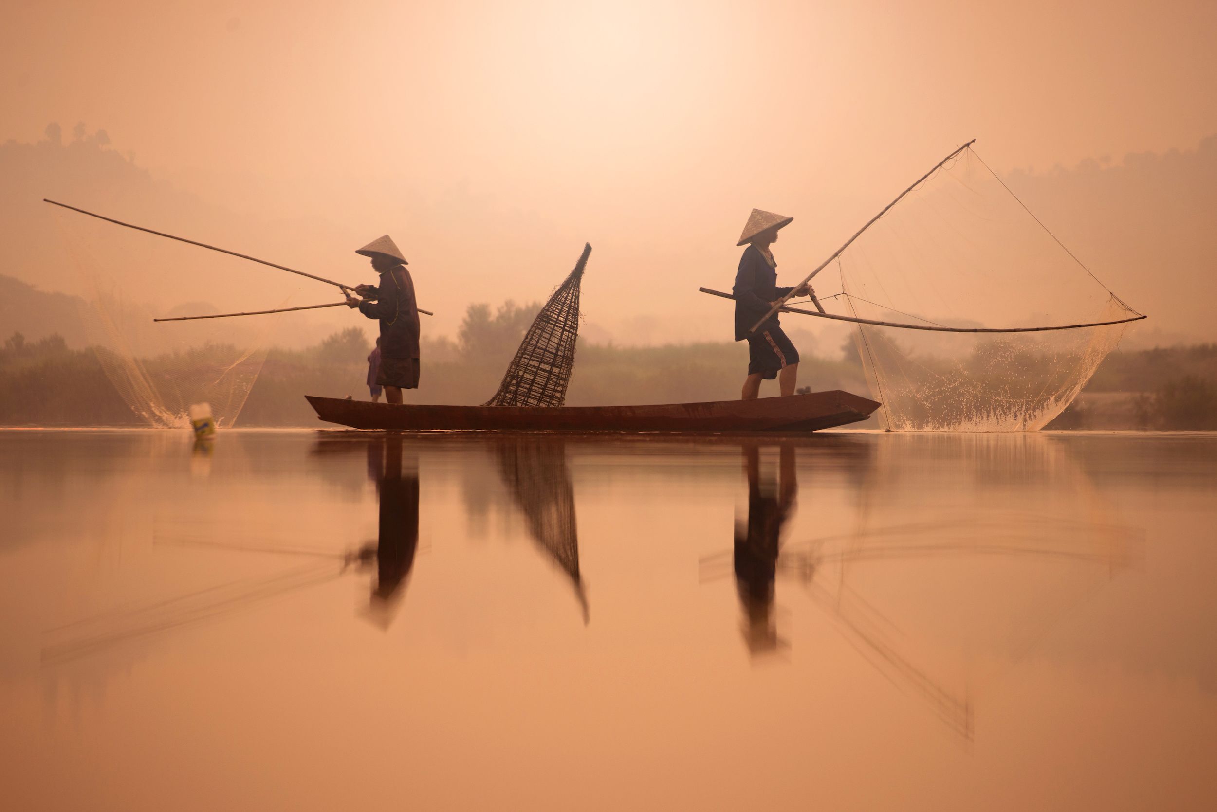 Fishers on the Mekong River, Vietnam.