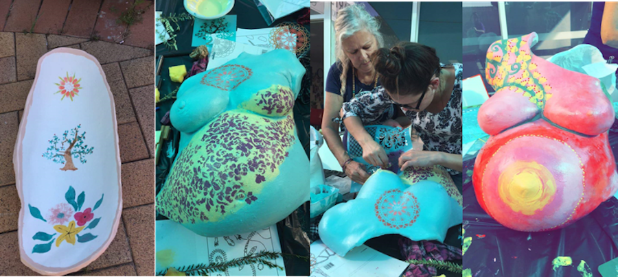 Colourful painted casts of pregnant bellies.