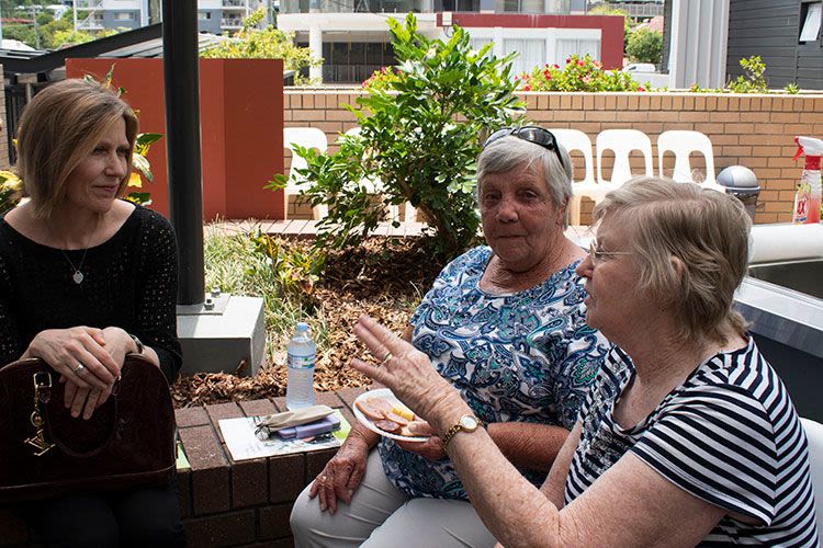Professor Lynda Cheshire speaking with Caggara House residents.
