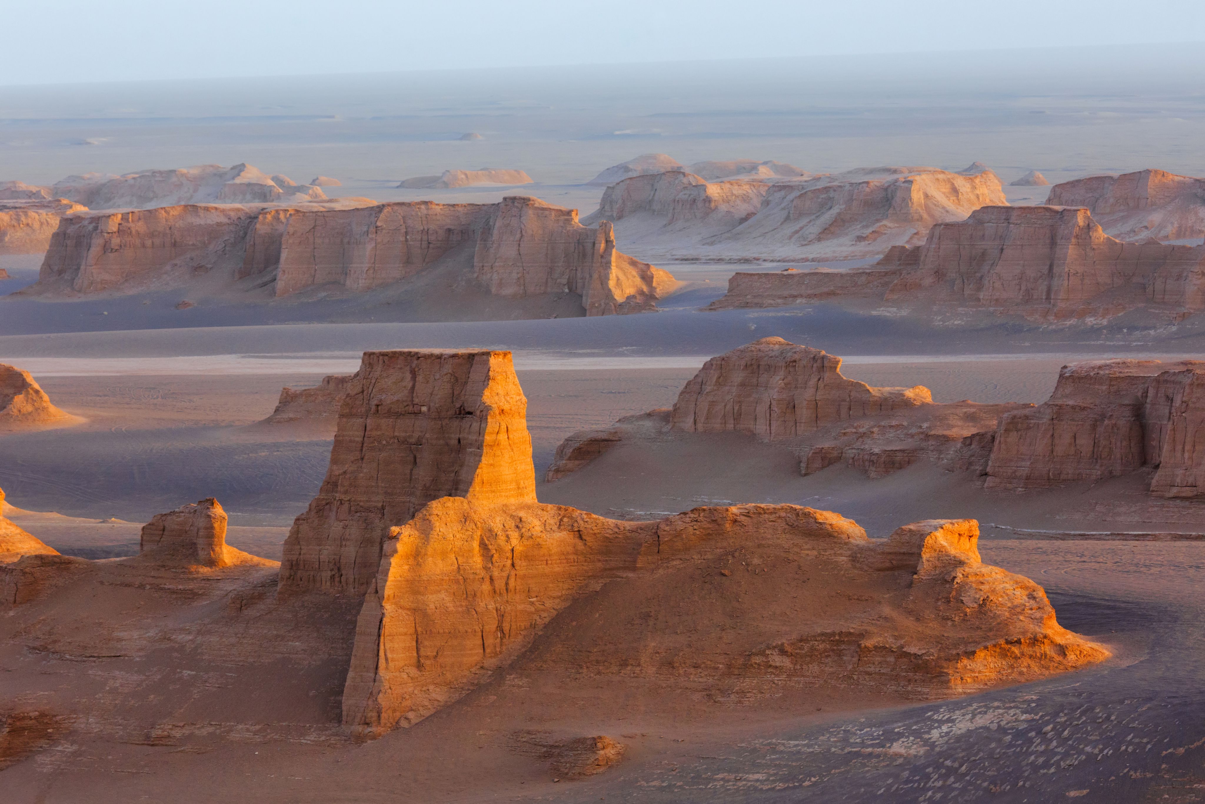 Red rock formations in the desert of Kalyuts, Iran.