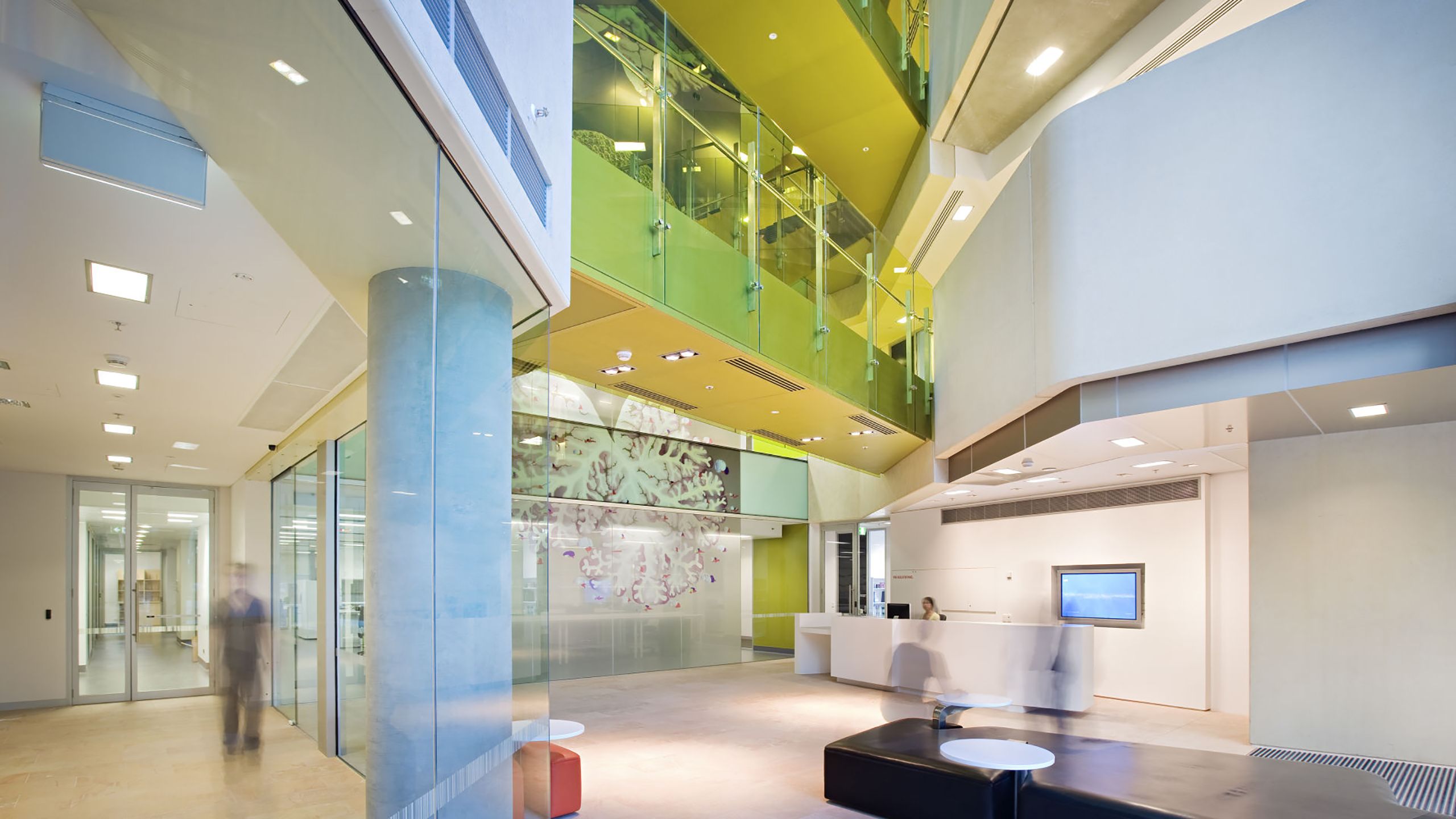 Photograph of the foyer at the Queensland Brain Institute depicting the reception desk and atrium 