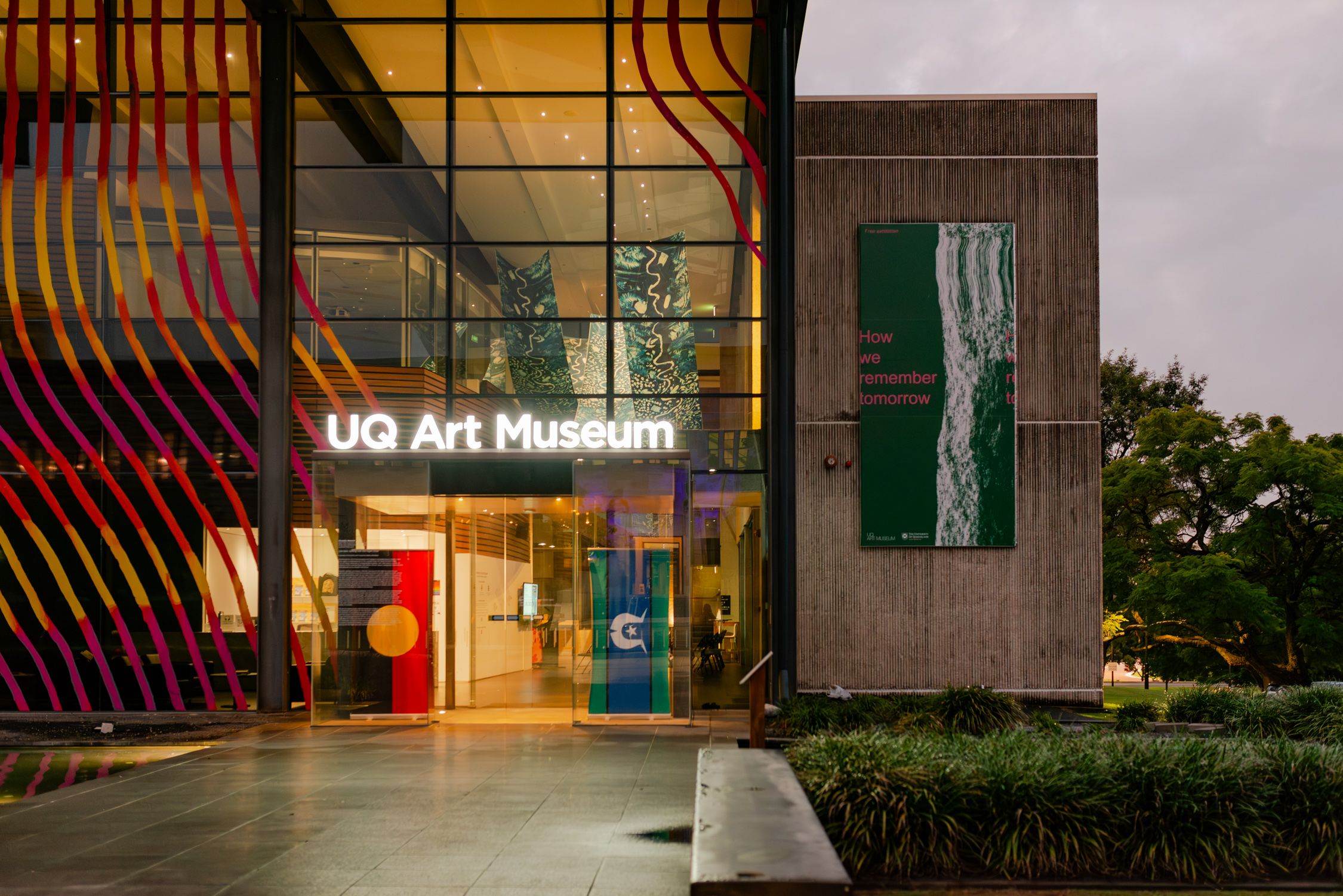 The UQ Art Museum front door at dusk.