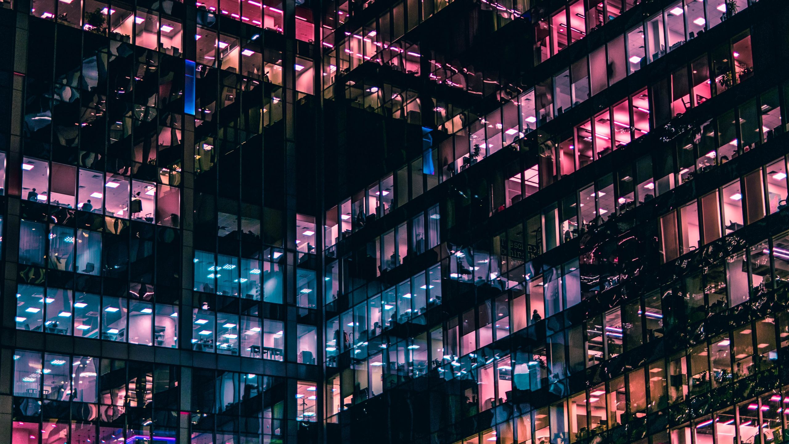 Image of an office building at night time
